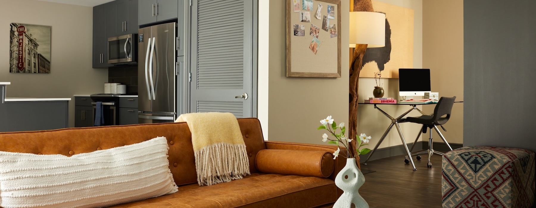 a living room with a couch and a table